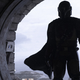 The Mandalorian enters.
